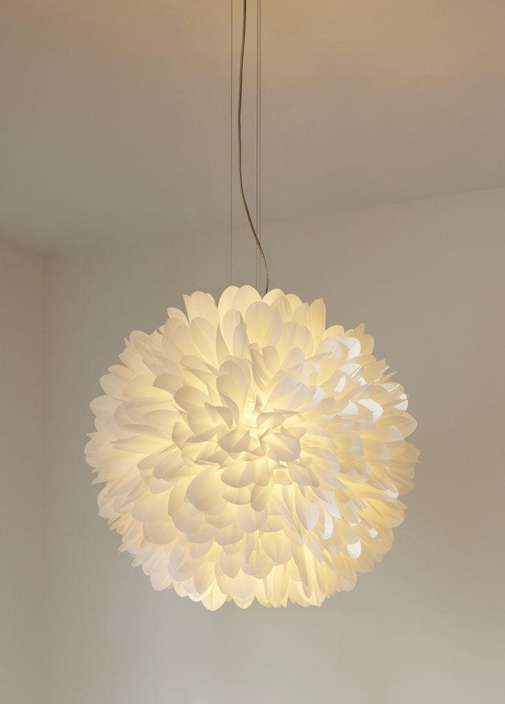 Blossom pendant lamp made of folded white washi paper petals by Heike Buchfelder